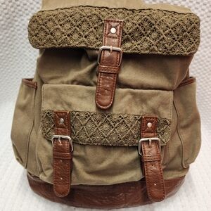 Cape Juby Green and Brown Vintage Backpack with Buckle Accents. Used. Good Condi